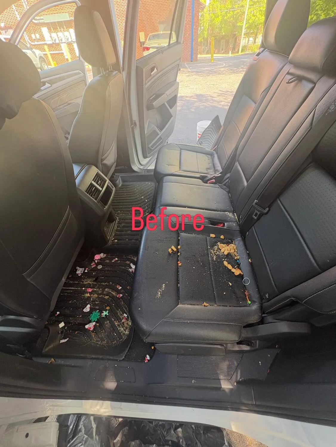 A messy car interior, the kind Aquarius details